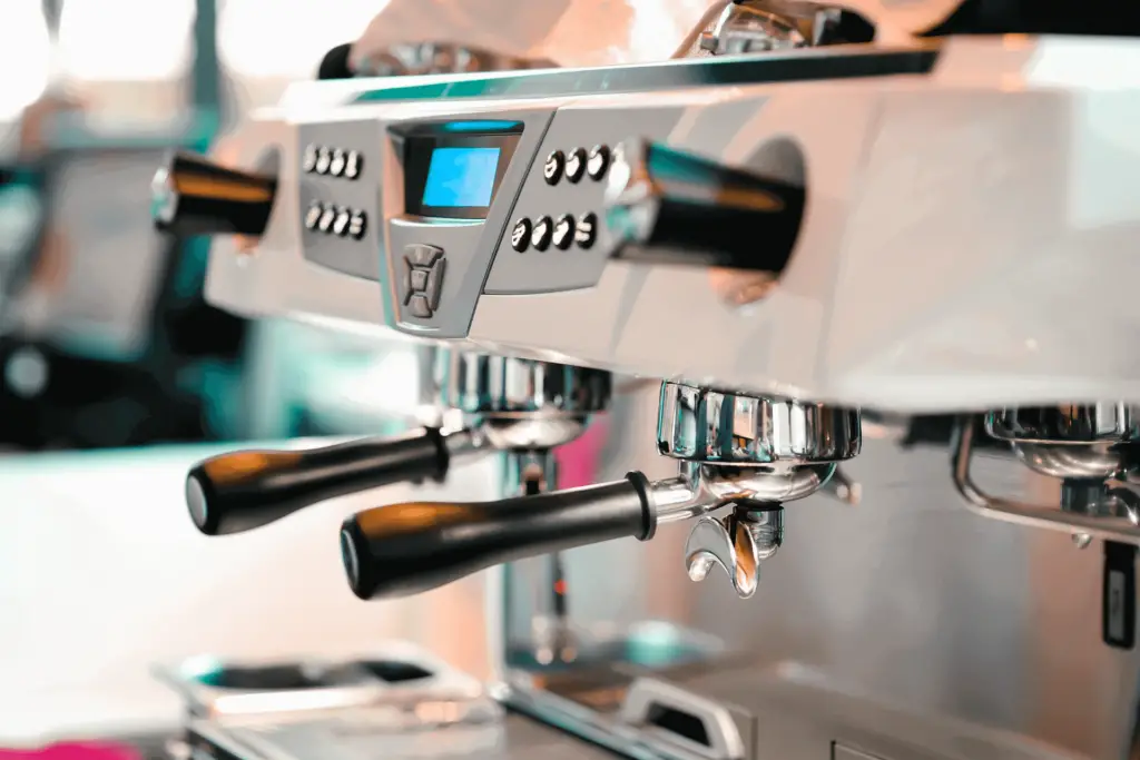 A high-end semi-automatic espresso machine with a digital display