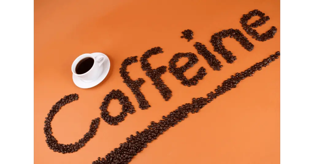 Coffee beans spelling out caffeine