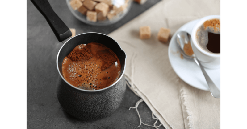 Turkish coffee being made in an Ibrik, a Turkish coffee pot