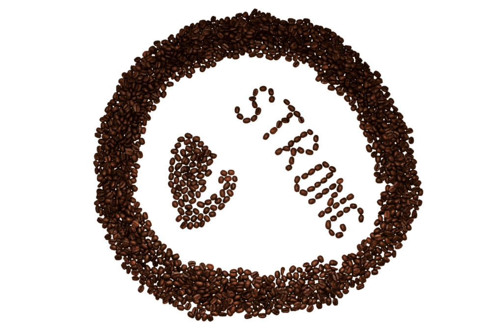 Coffee beans arranged to spell out strong