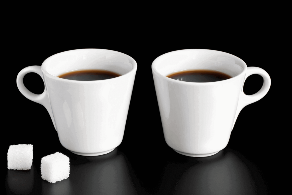 Two cups of coffee, ready for comparison