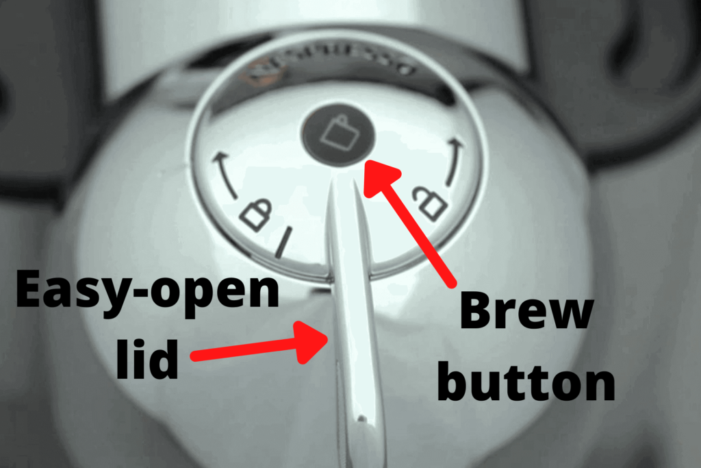The controls for a Nespresso Vertuo machine, showing the start button and lid handle